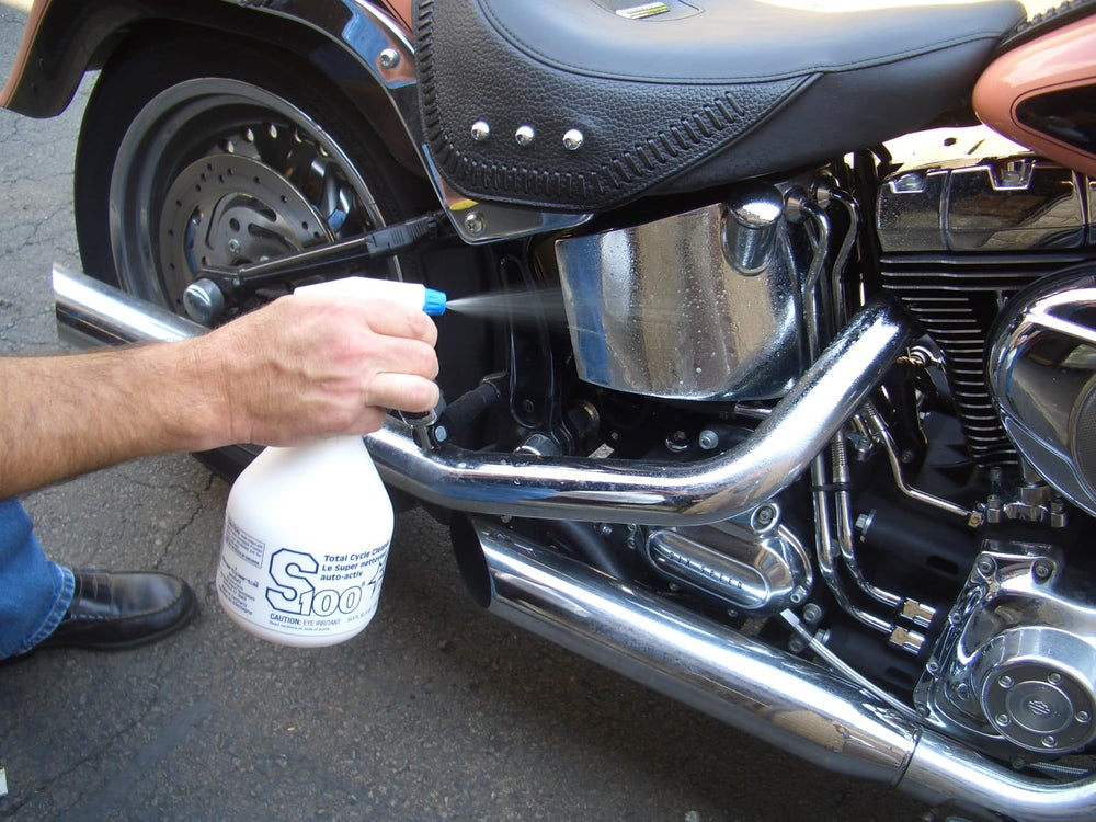 S100 Total Cycle Cleaner in action on motorcycle bodywork.
