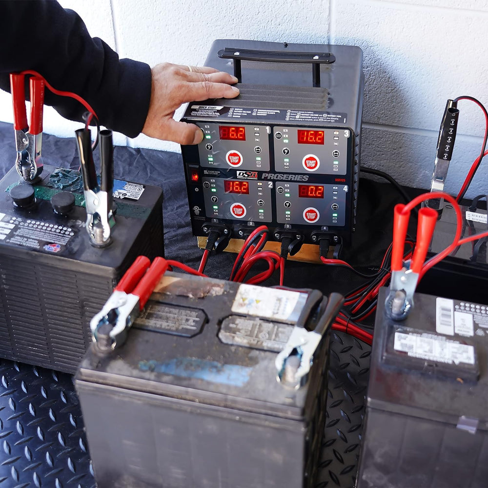 Schumacher DSR125 cables and clamps ready for four-bank charging