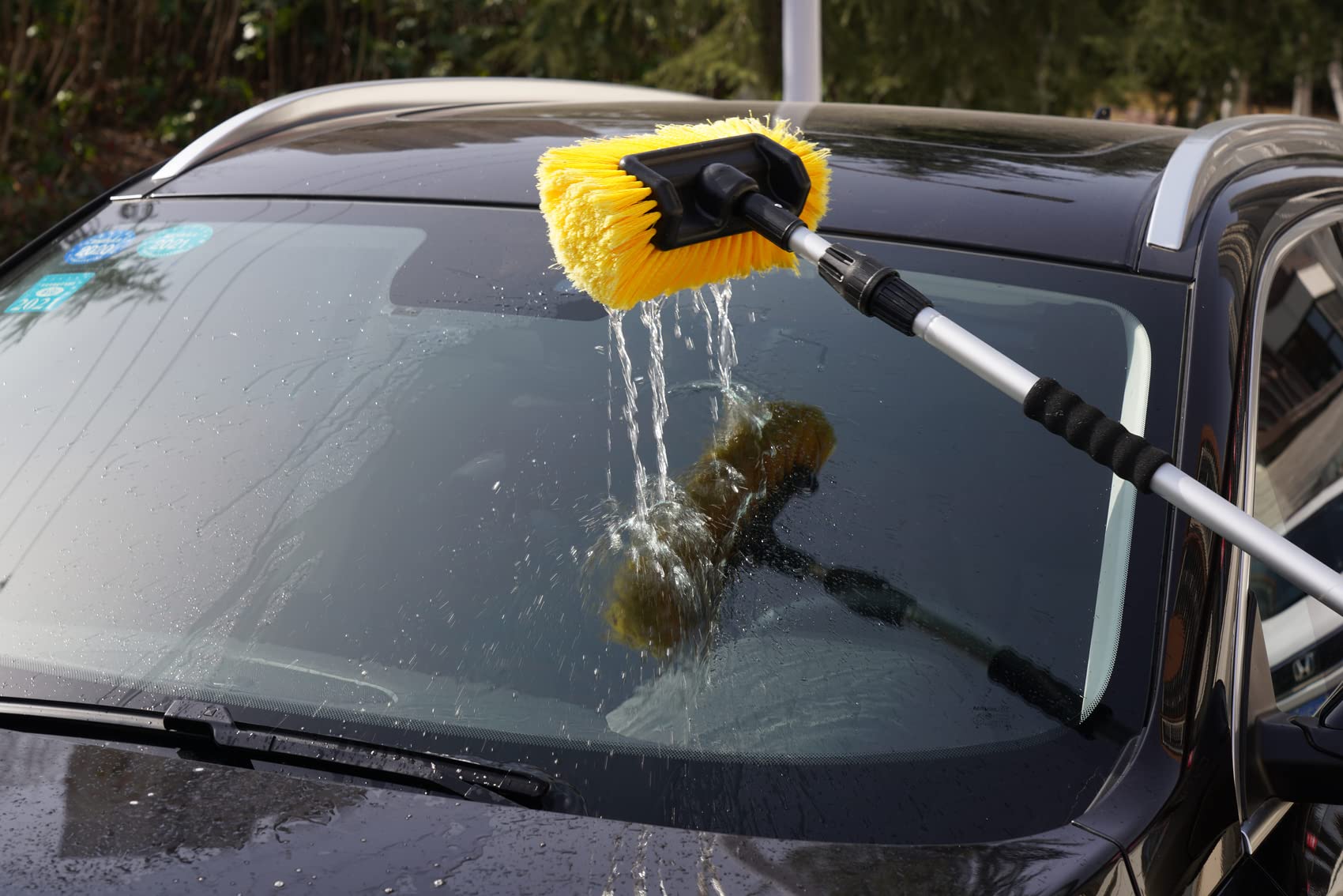SCRUBIT soft-bristle brush safe on finishes while lifting grime.