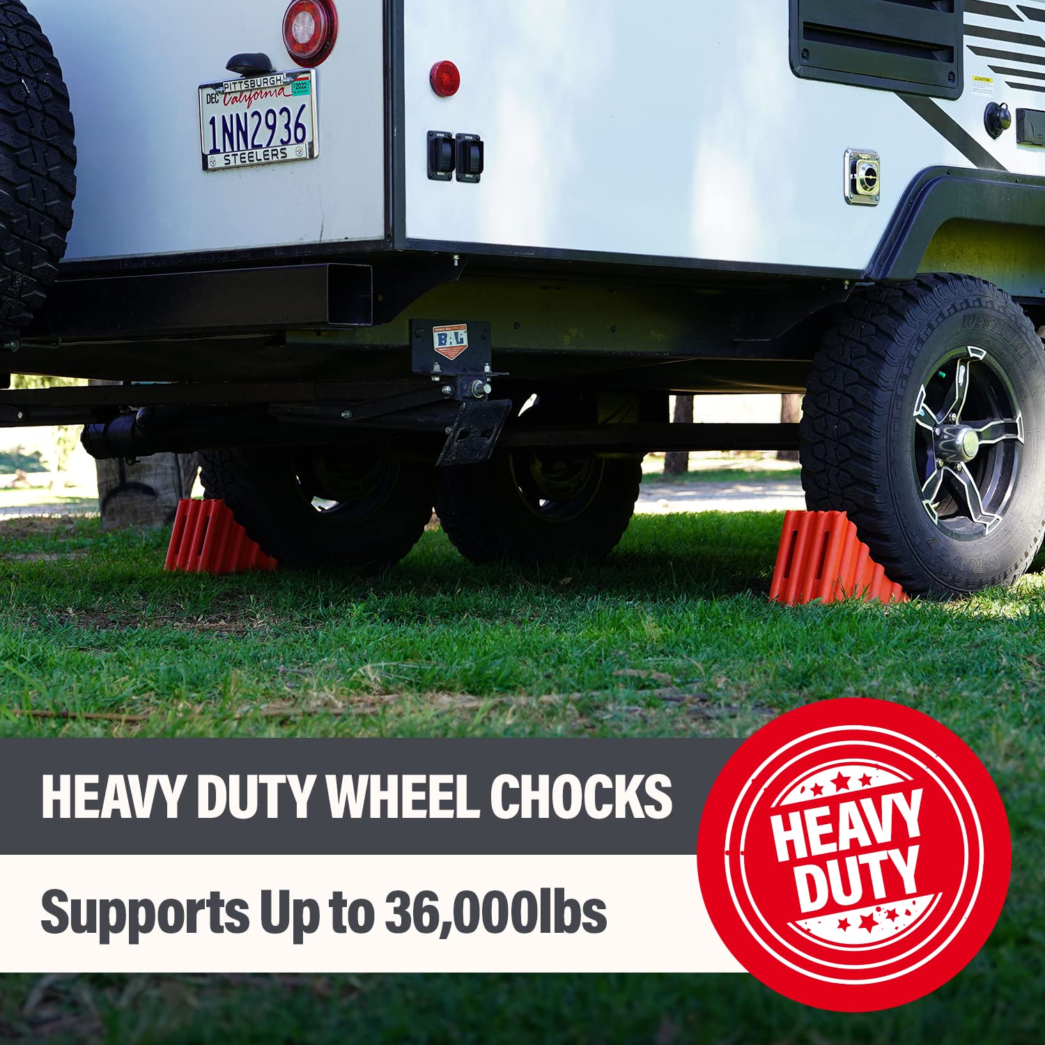 Solid polypropylene chocks resist impact while stabilizing large vehicles.
