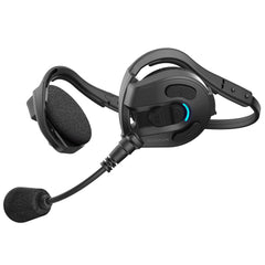 Sena Expand Mesh intercom headset on a rugged hiking trail for hands-free communication.