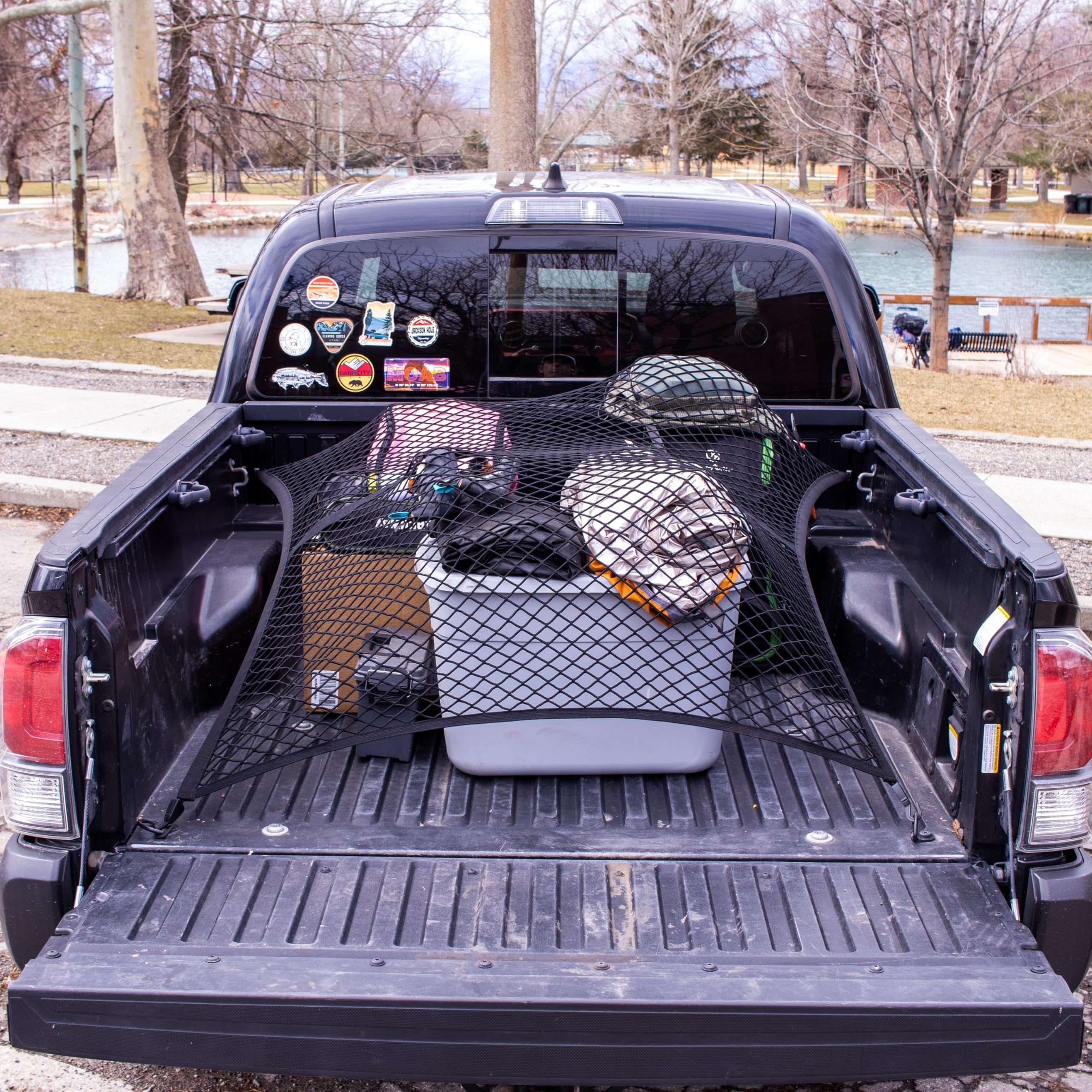 SENYAZON stuffed animals secured and organized in the truck bed.