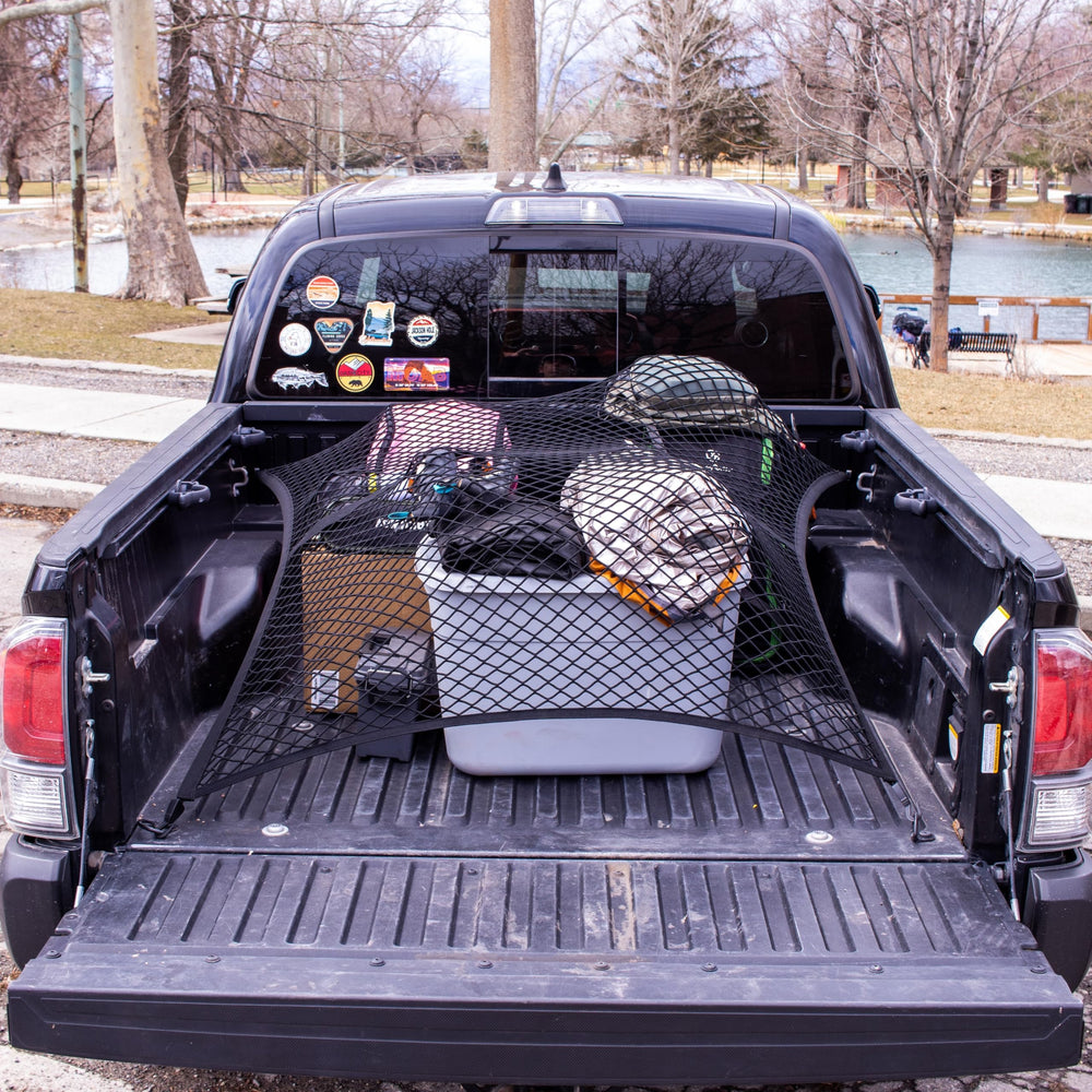 SENYAZON stuffed animals secured and organized in the truck bed.