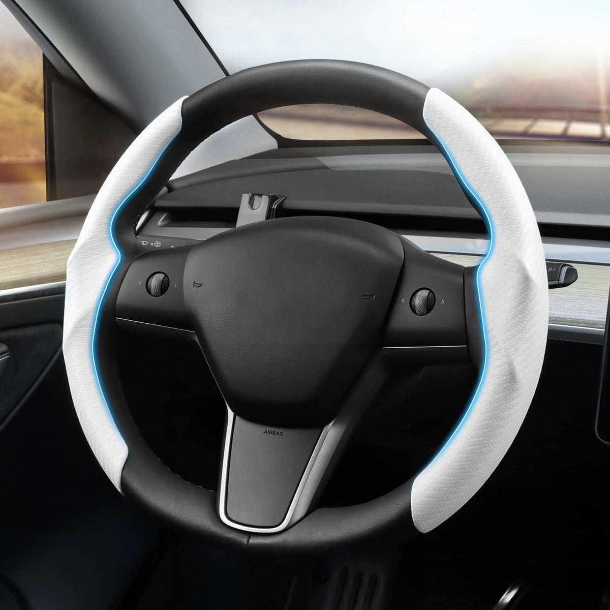 Shademax carbon-fiber steering cover on Model Y enhances grip and style
