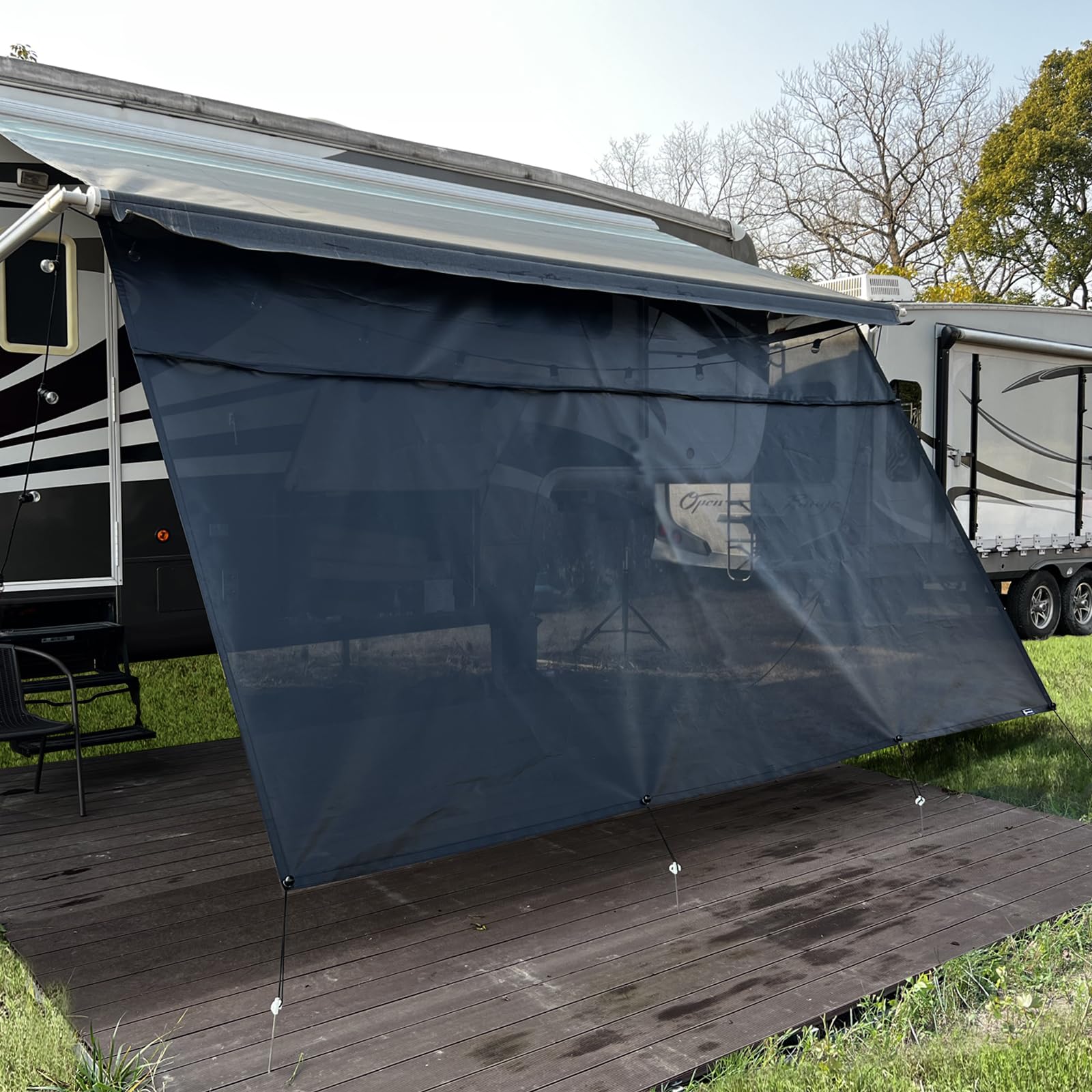 SHADEPLUS RV Awning Screen with black mesh provides shade and privacy for outdoor camping.