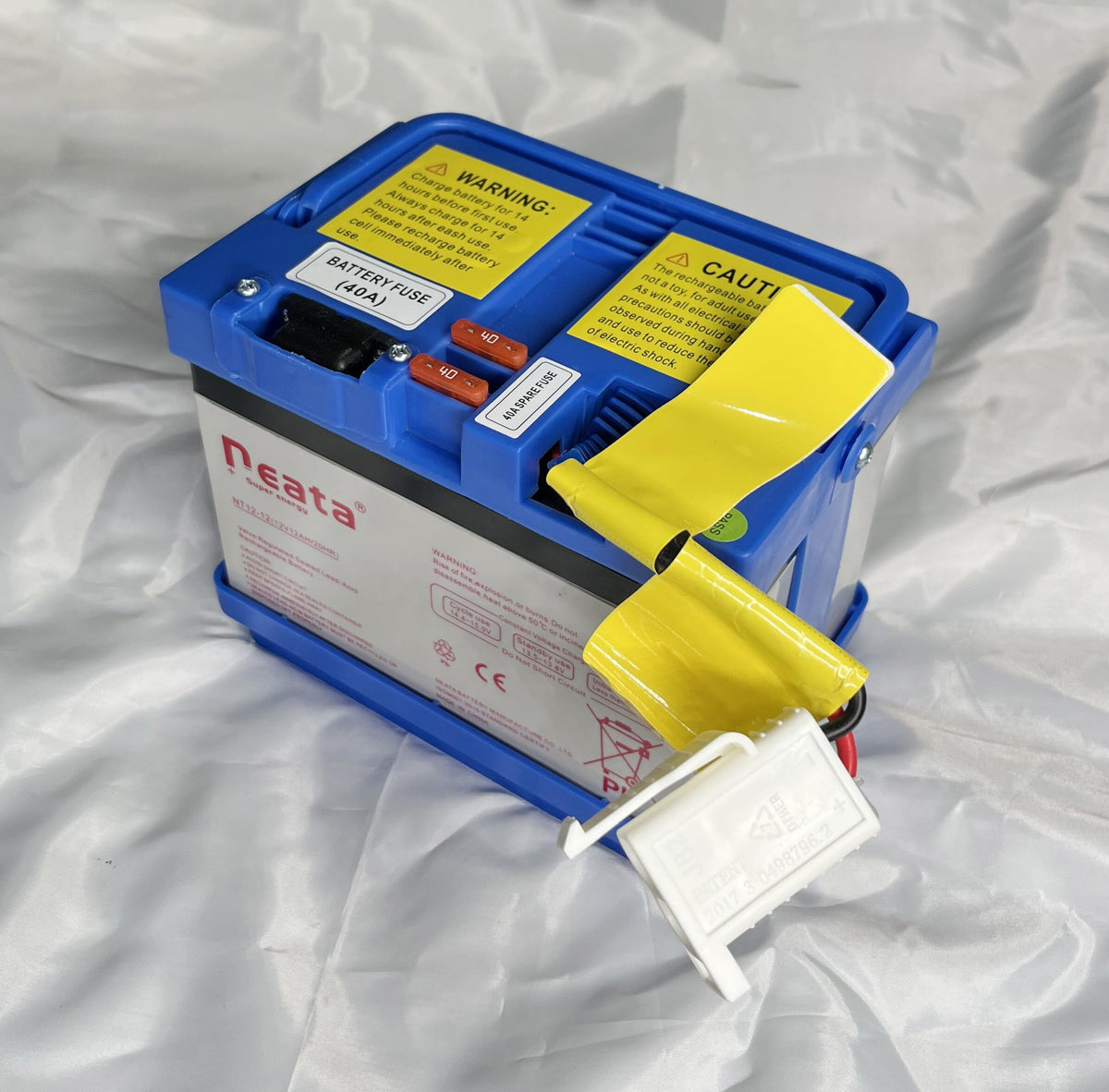 SHARIVVY 12V SLA battery exterior with white plug for easy ride-on toy replacement.