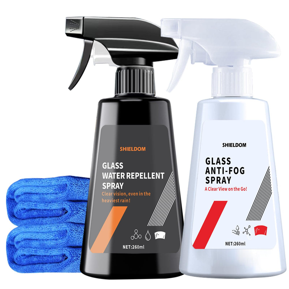Shieldom anti-fog spray bottle on windshield demonstrates easy spray application.