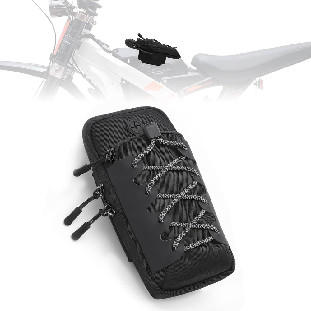 Silutrcn electric dirt bike front bag mounted on battery cover for seamless on-the-go storage.
