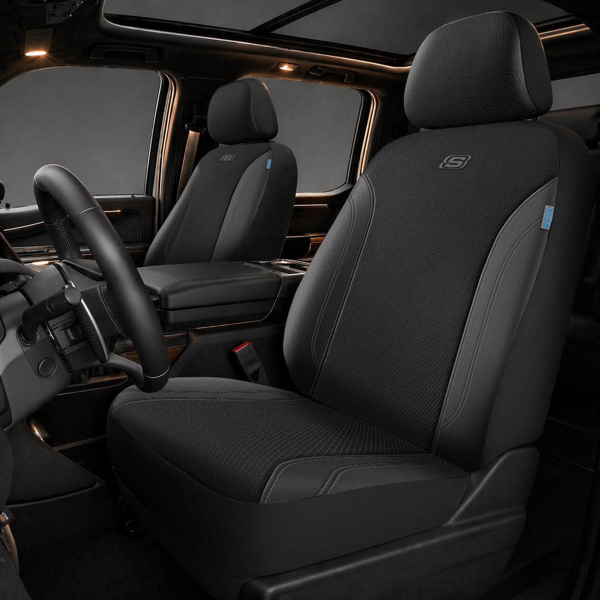 Skechers Work Seat Covers on the front seat with leather and Oxford fabric for durable protection.