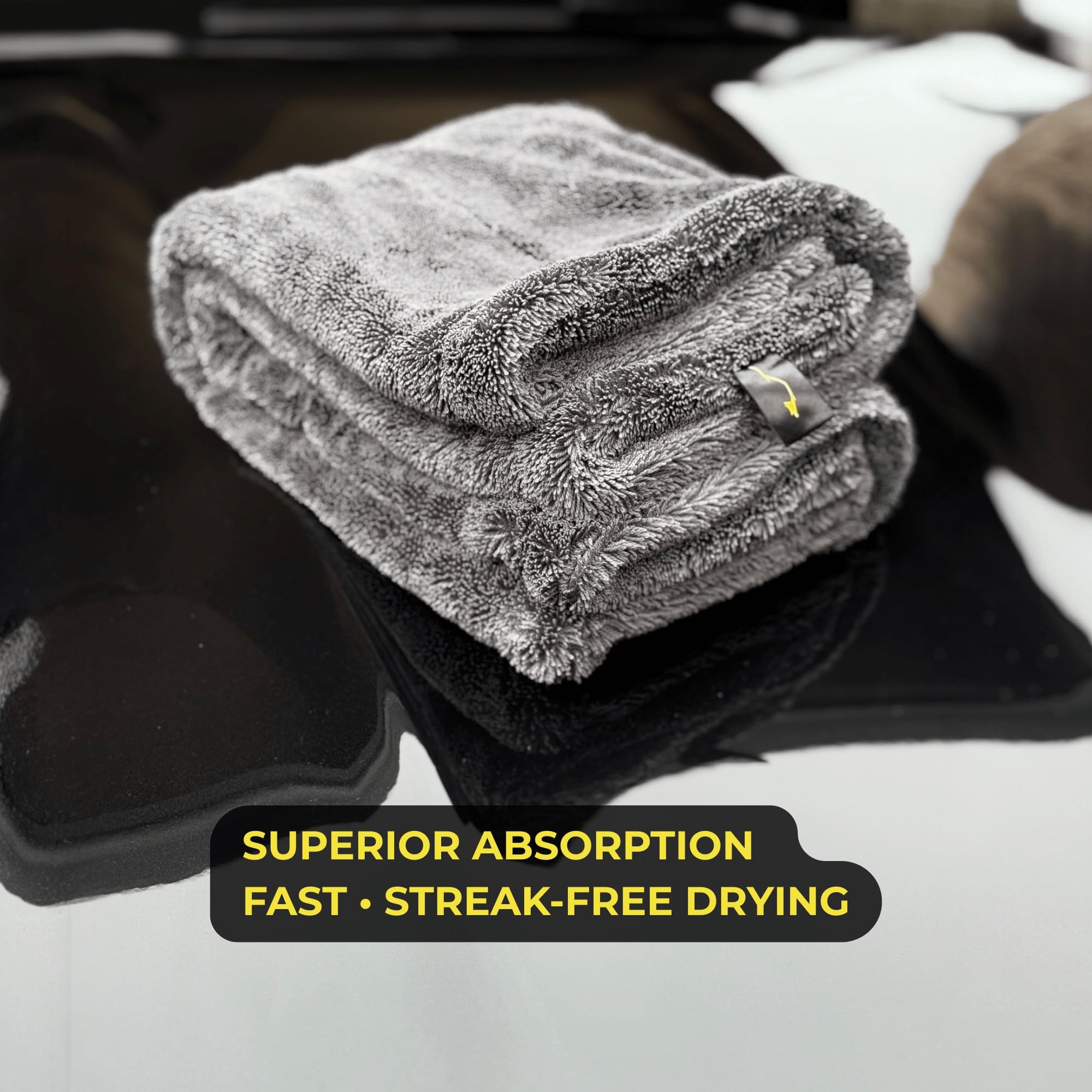 Sleek Dudes 20x31 towel covering large panels with controlled drying.
