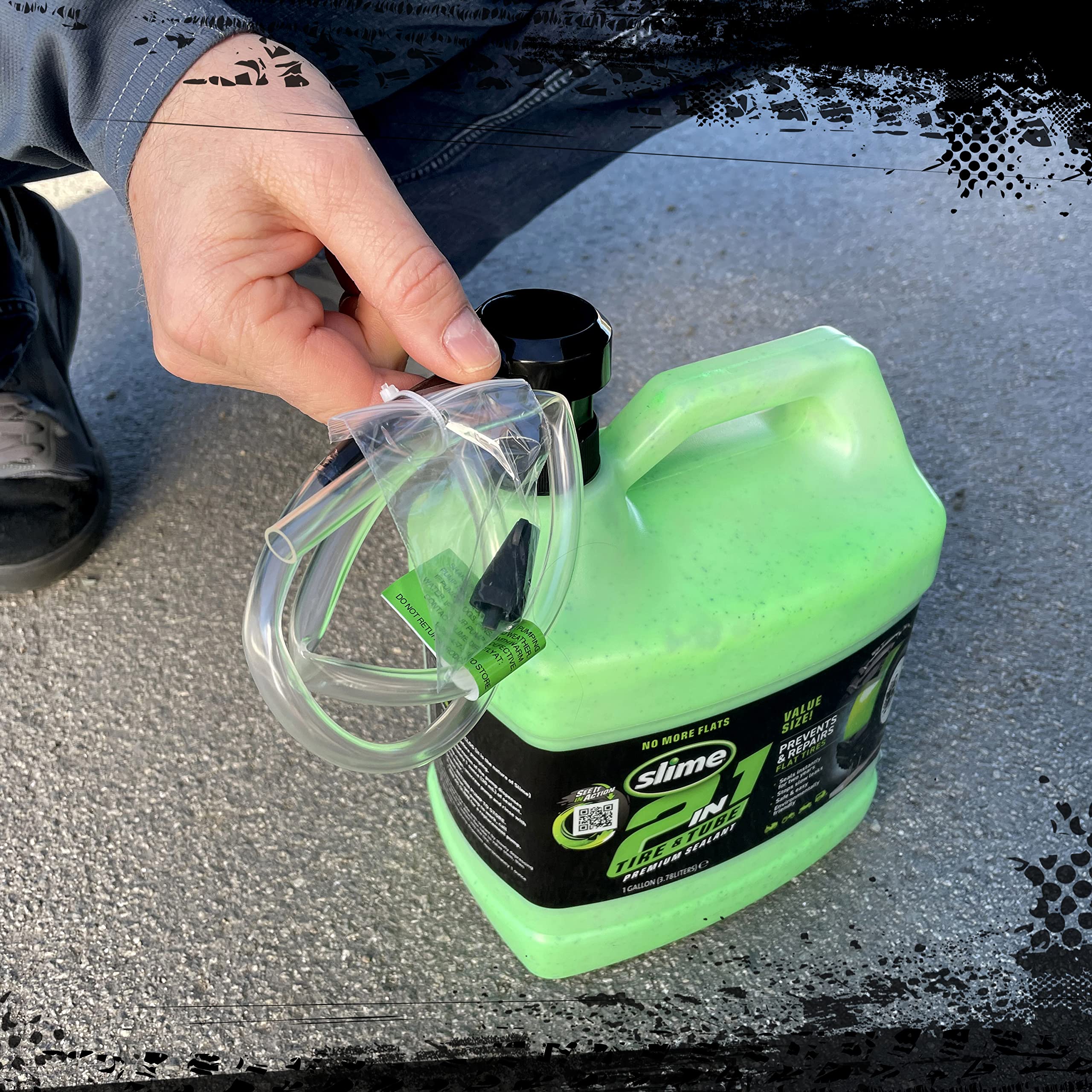 Pouring Slime sealant into a tire to seal a puncture