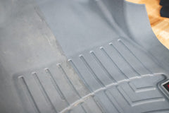 Bumper trim being treated to protect against fading with Fusion Grey Trim Restorer