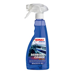 SONAX Dashboard Cleaner bottle applying foam on textured dashboard for a refreshed matte finish.