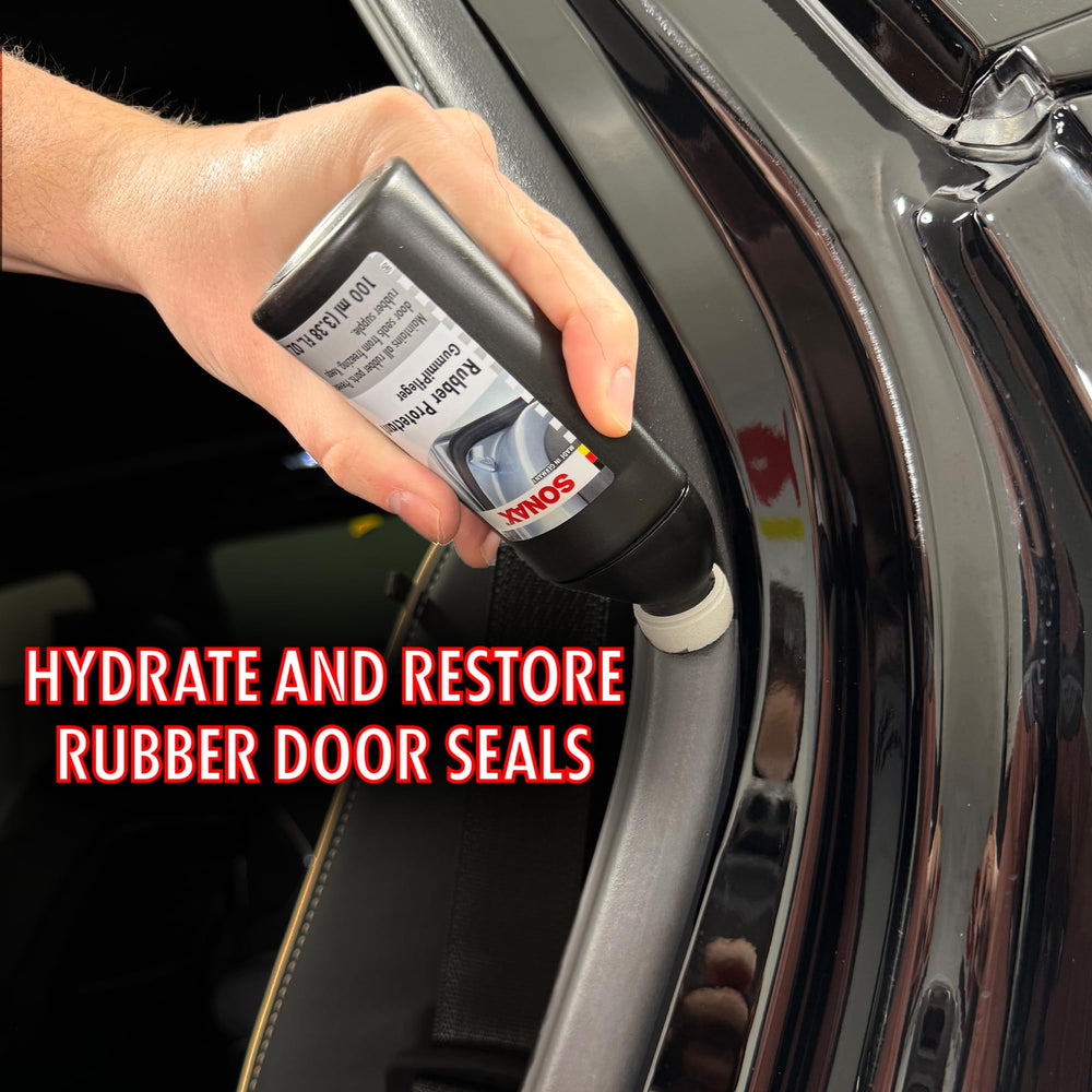 Floor mat edge cleaned with SONAX Rubber Protectant for renewed color