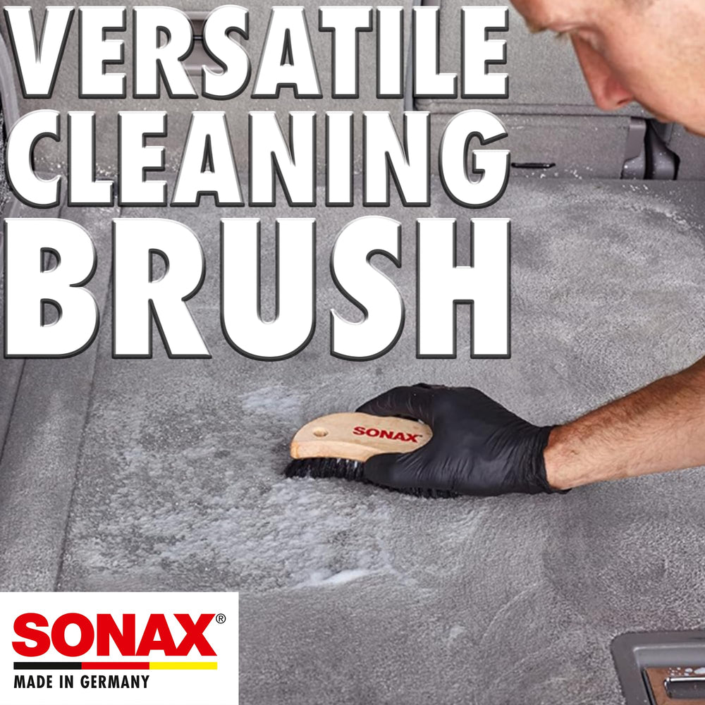 SONAX brush cleaning fabric upholstery inside a vehicle