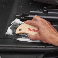 SONAX Textile & Leather Brush showing soft bristles for gentle fabrics