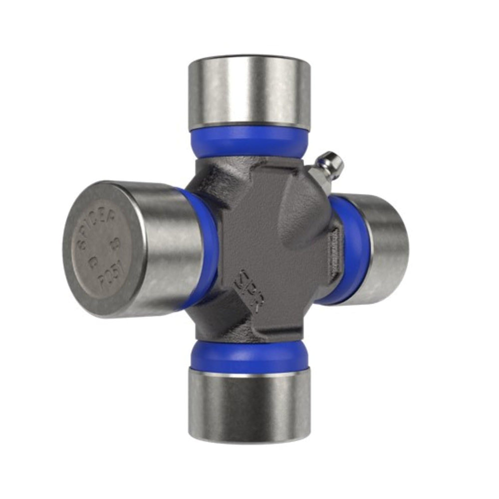Spicer U-joint kit components on metal workbench indicating high-quality forgings.
