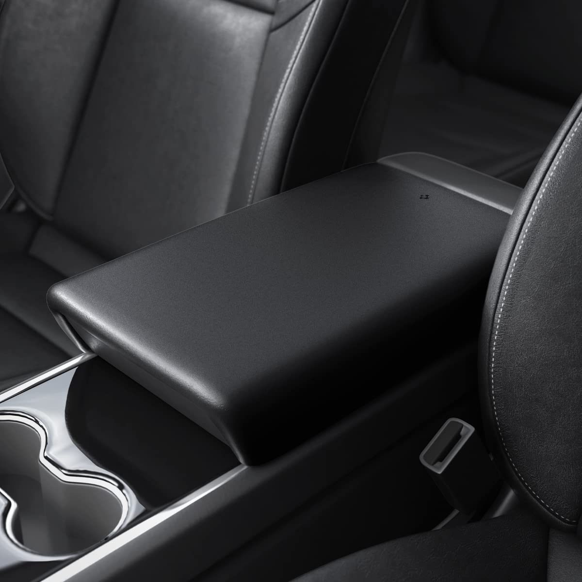 Spigen center console armrest cover on Tesla Model Y closeup showing durable TPE surface