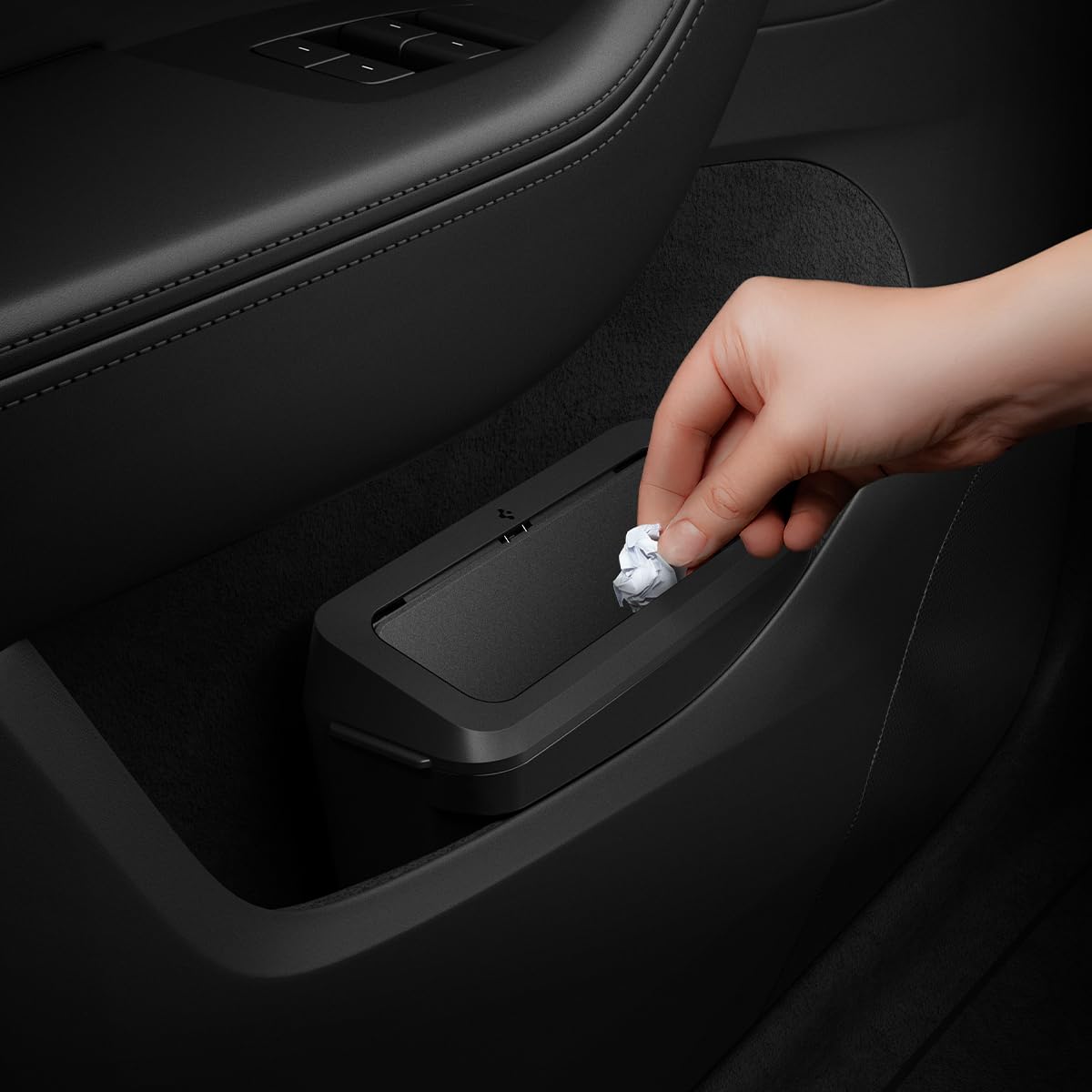 Spigen door-pocket-xl trash can with magnetic lid keeps Tesla Model Y cabin tidy.