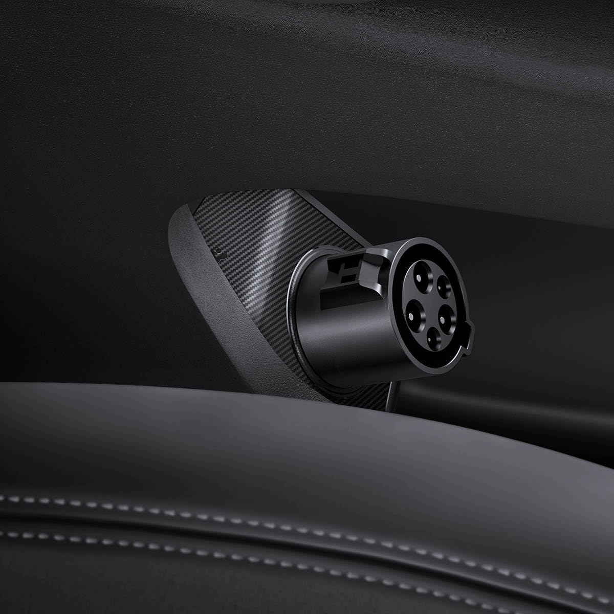 Spigen J1772 door dock closeup showing durable TPE texture for Model X