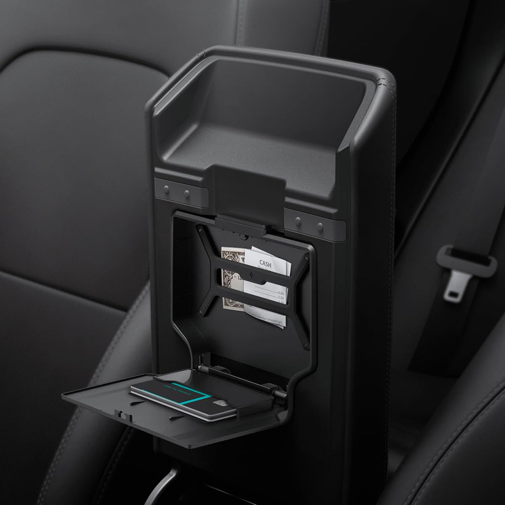 Spigen One-Tap Hidden Storage Box for Tesla Model Y Juniper installs under the armrest for secure storage.