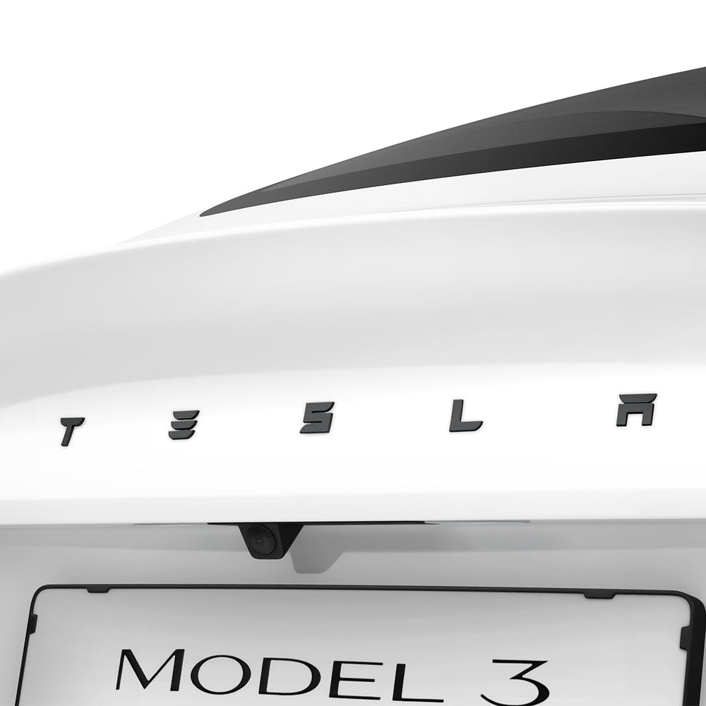 Spigen rear emblem full-cover sticker on Tesla Model 3 Highland provides scratch protection.