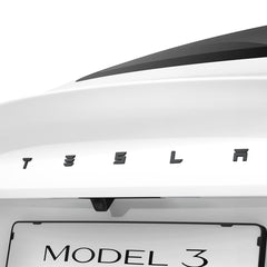 Spigen rear emblem full-cover sticker on Tesla Model 3 Highland provides scratch protection.