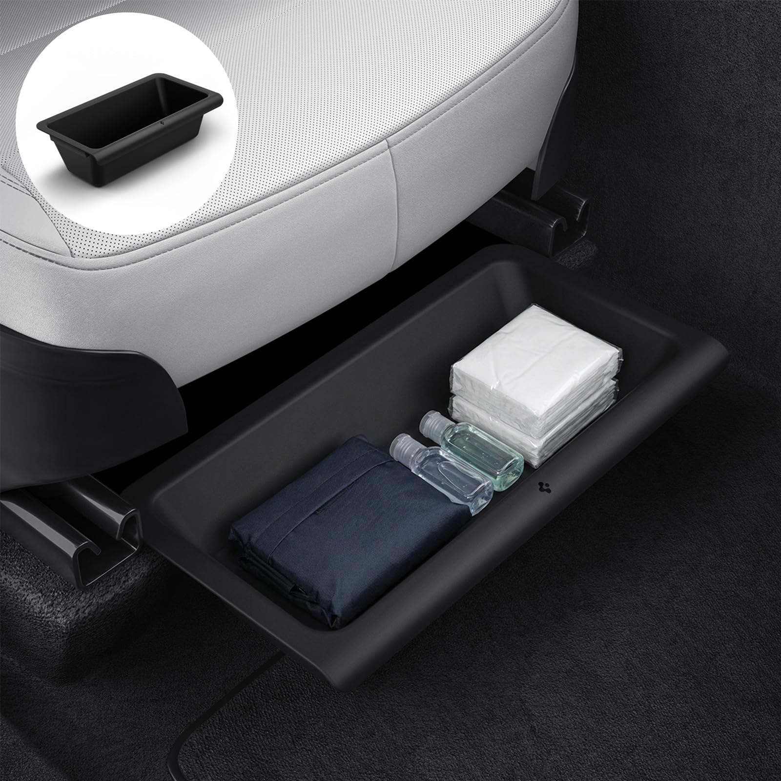 Spigen under-seat storage box neatly tucks under Model Y for organized cargo.