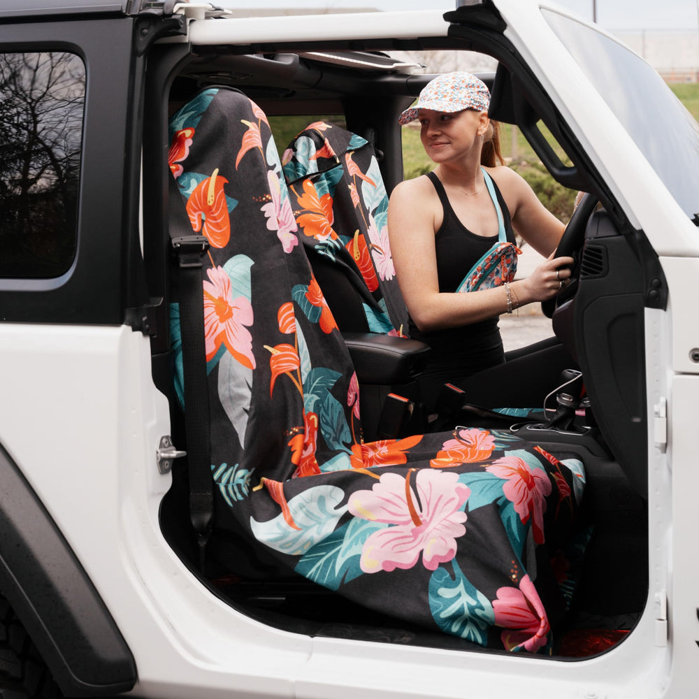 Sprints towel car-seat setup secures protection during commutes.