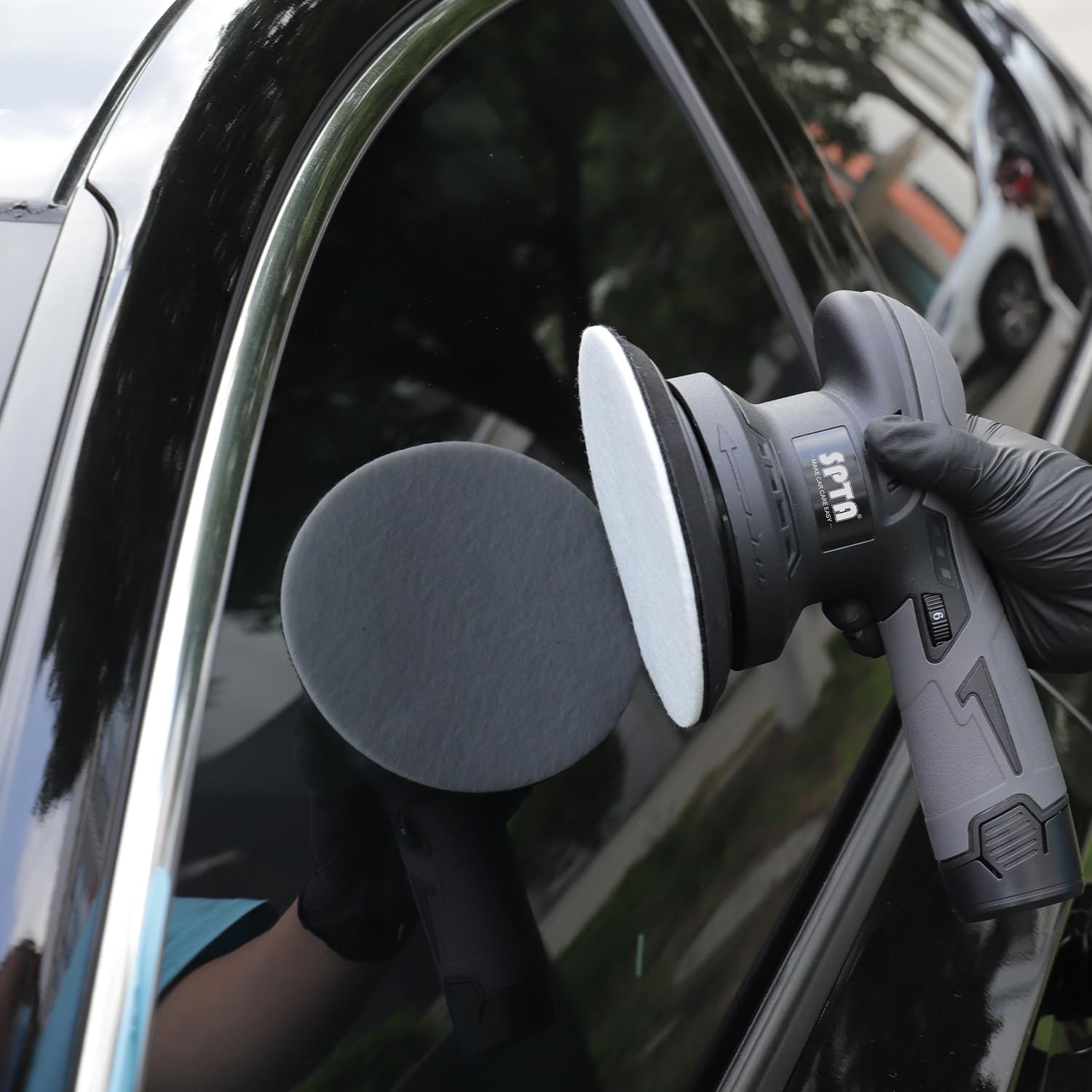 SPTA car window polishing on windshield surface