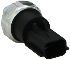 PS404 oil pressure switch packaging view showing compact OEM-style unit