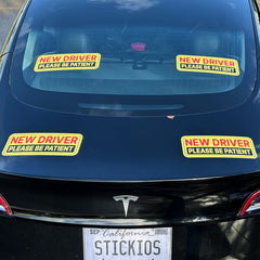 Stickios New Driver Stickers on car window demonstrate reusable, residue-free practice decals.