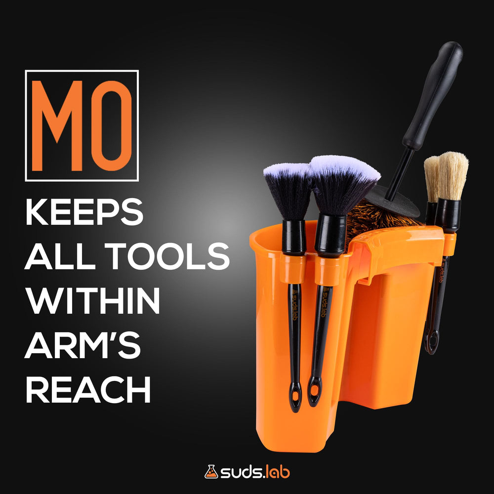 Suds Lab brush holder and glove compartment keeps essentials organized