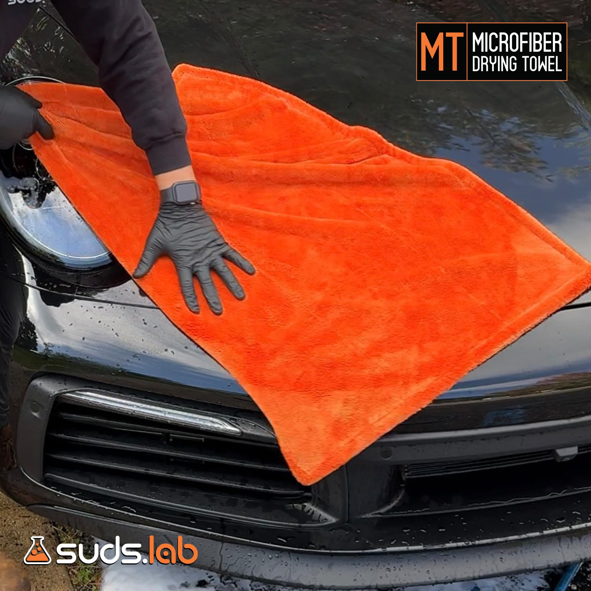 Suds Lab large microfiber towel drying a car body after washing