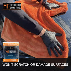 Suds Lab microfiber towel on carbon fiber surfaces during wipe-downs