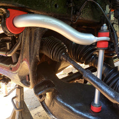 Suspension Dudes Code Red bushings close-up shows durable polyurethane construction.