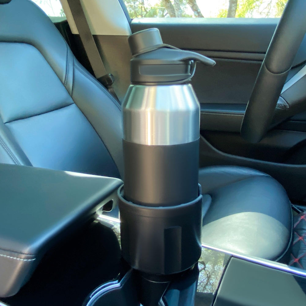 Swigzy expanding base adjusts from 2.6 to 3.8 inches for most cup holders.