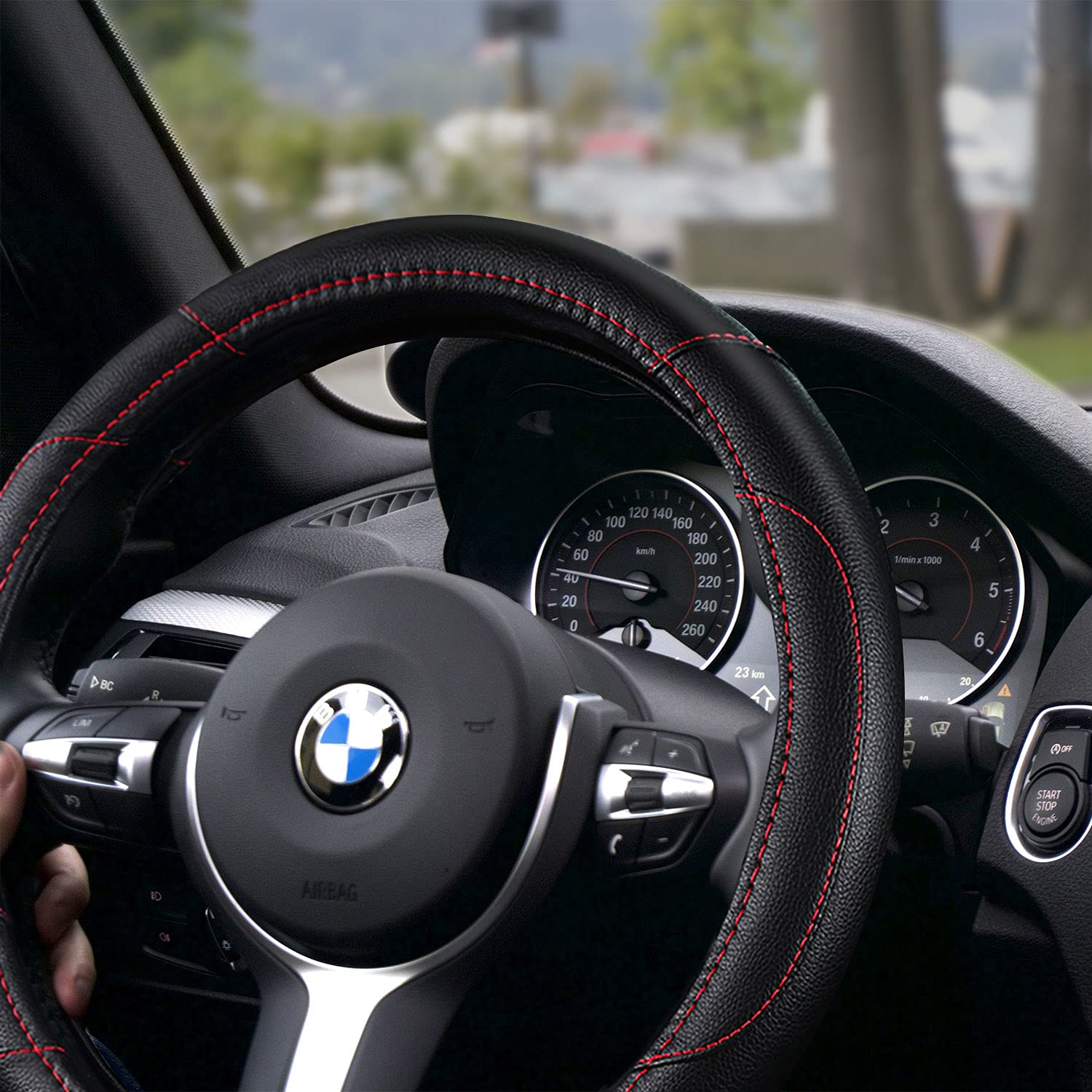 szttswamp leather steering wheel cover non-slip grip closeup emphasizes secure handling.