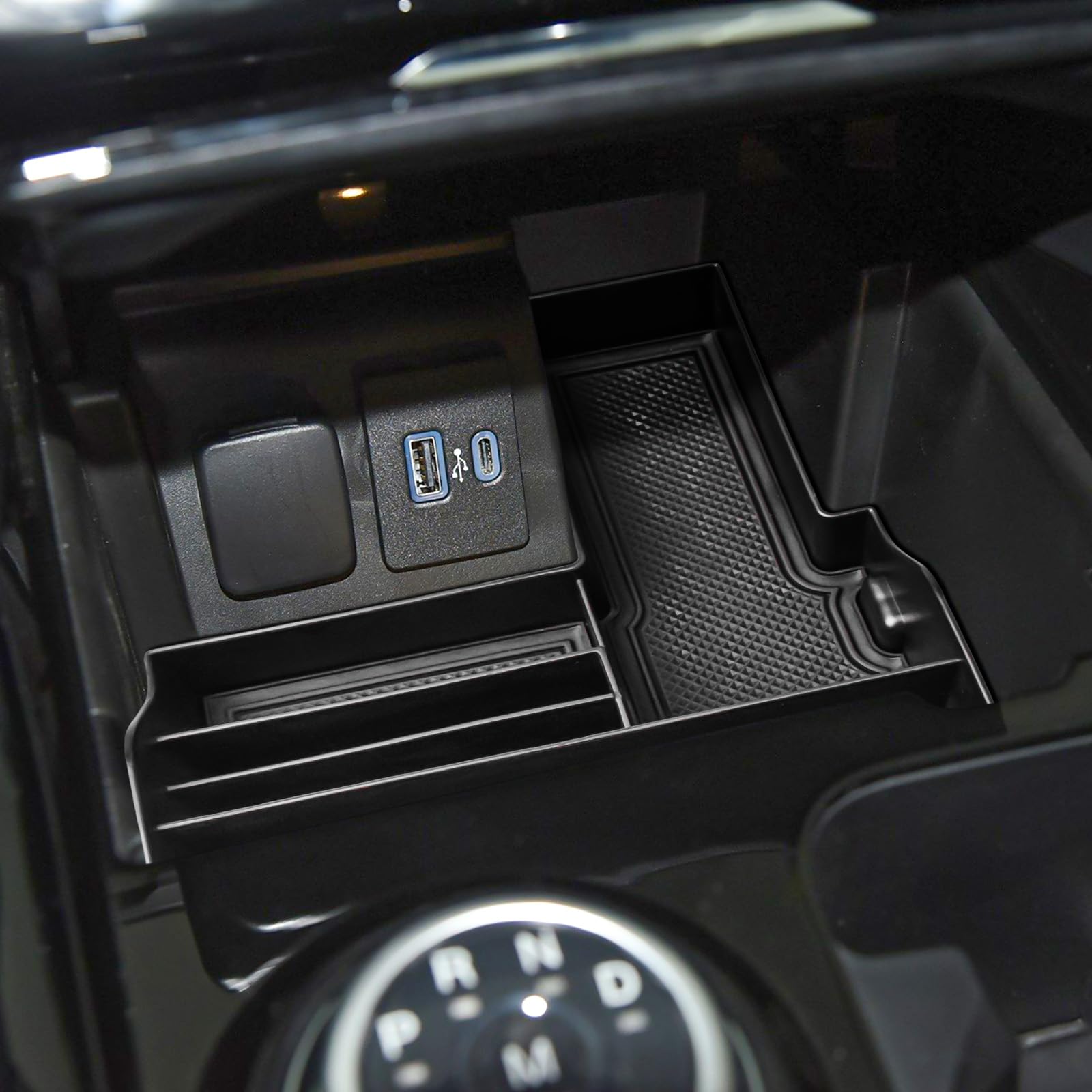 Tray design preserves console port access while keeping cords managed.