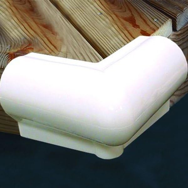 TaylorMade 90-degree dock corner bumper in white installed flush for a clean mooring look.