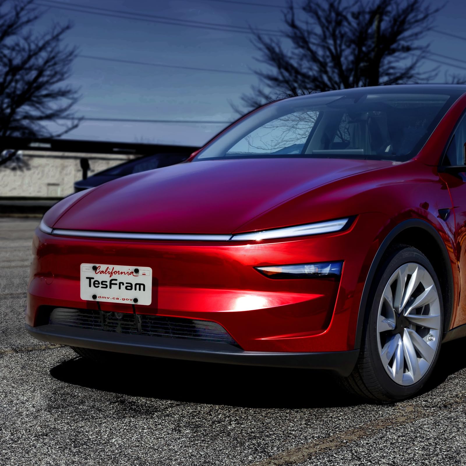 TesFram Model Y Juniper license plate mount preserves front camera visibility for Autopilot