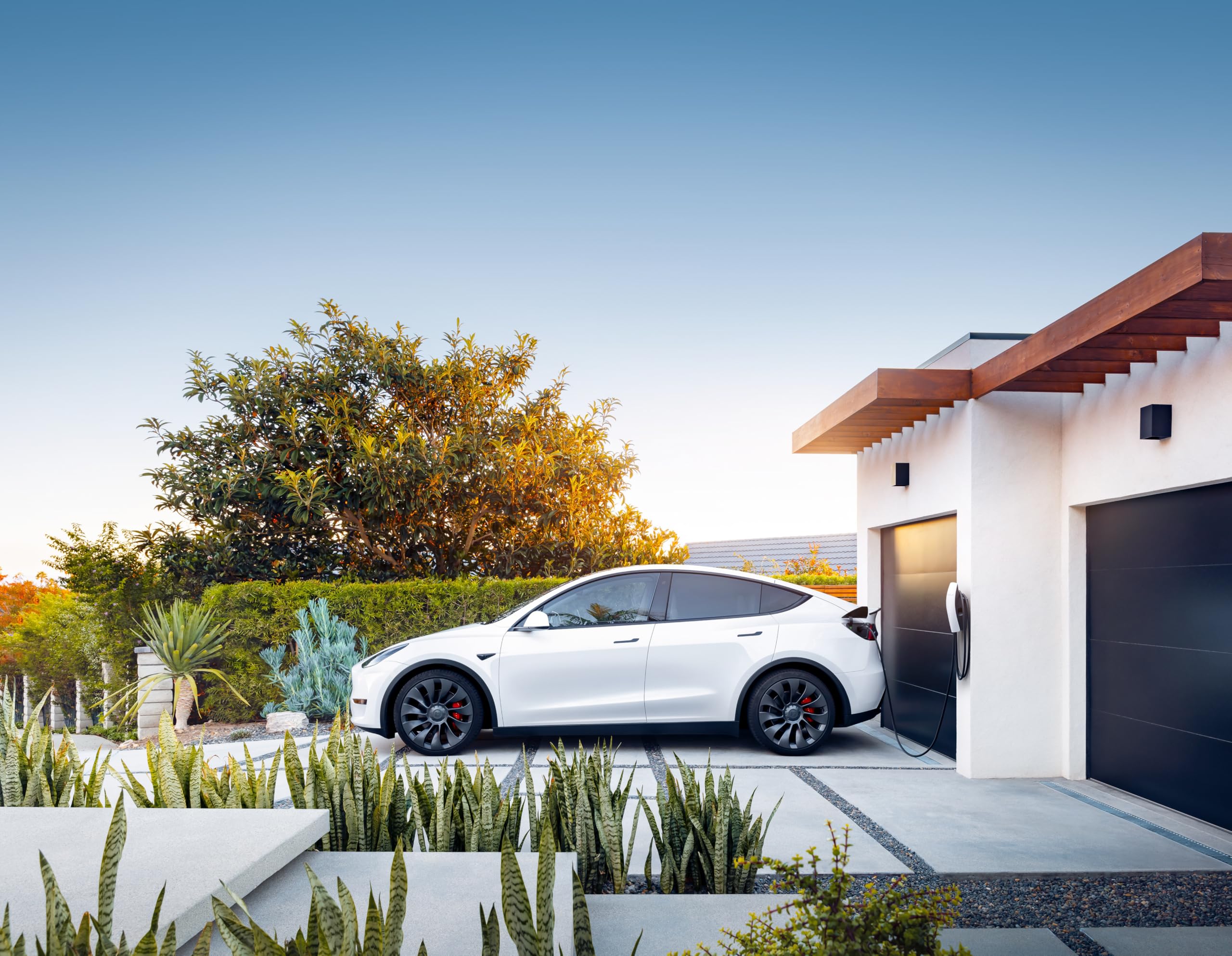 Tesla Wall Connector delivers up to 44 miles of range per hour of charging.