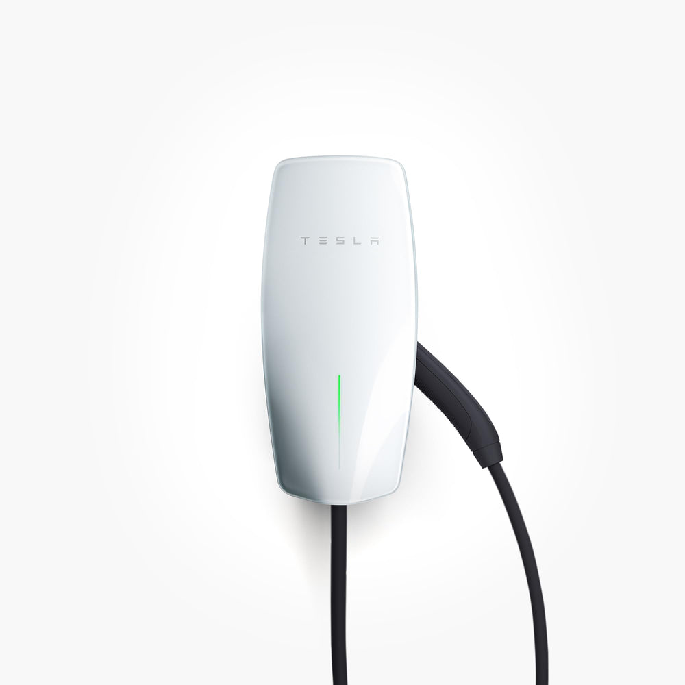Tesla Wall Connector installed outdoors for versatile charging in all weather.
