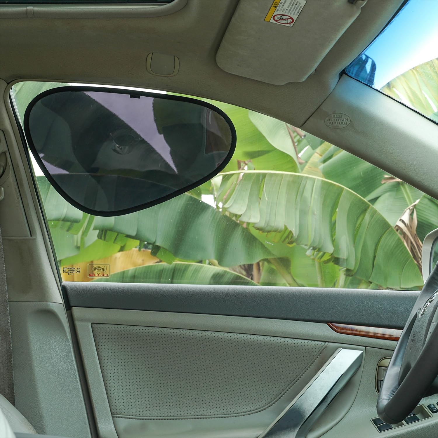 TFY car sun shade preserves visibility while reducing interior heat.