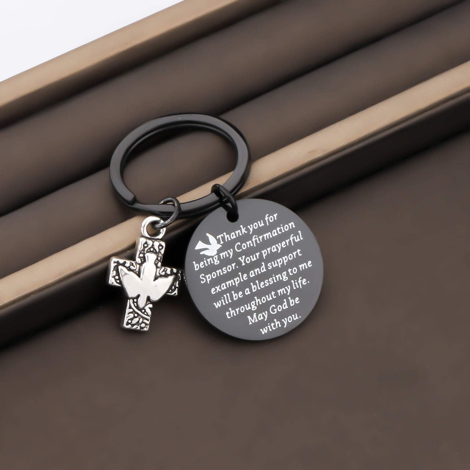 TGBJE Gift-ready sponsor keychain with velvet pouch included.