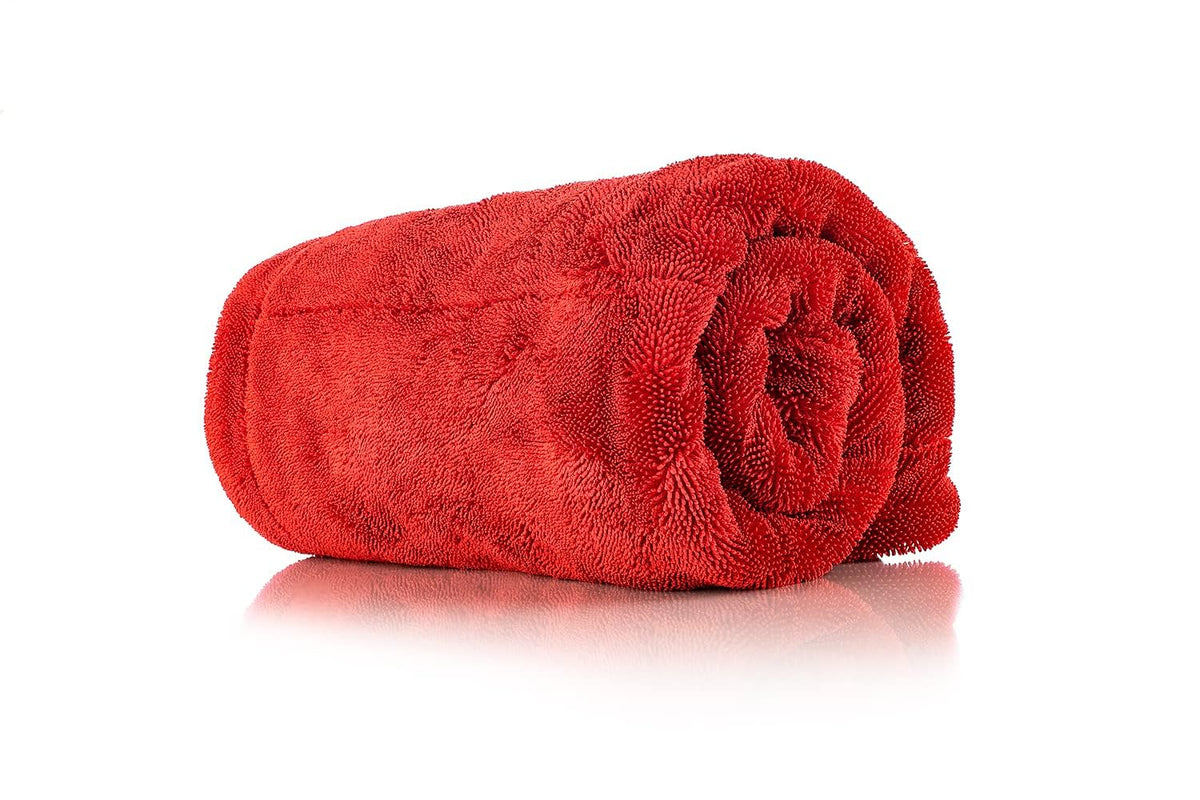 The Rag Company 1500 heavy-duty car drying towel on a large truck surface for quick drying