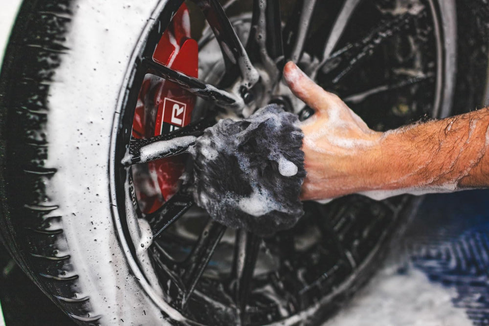 Wheel detailing mitt provides precise control and even coverage on spokes.