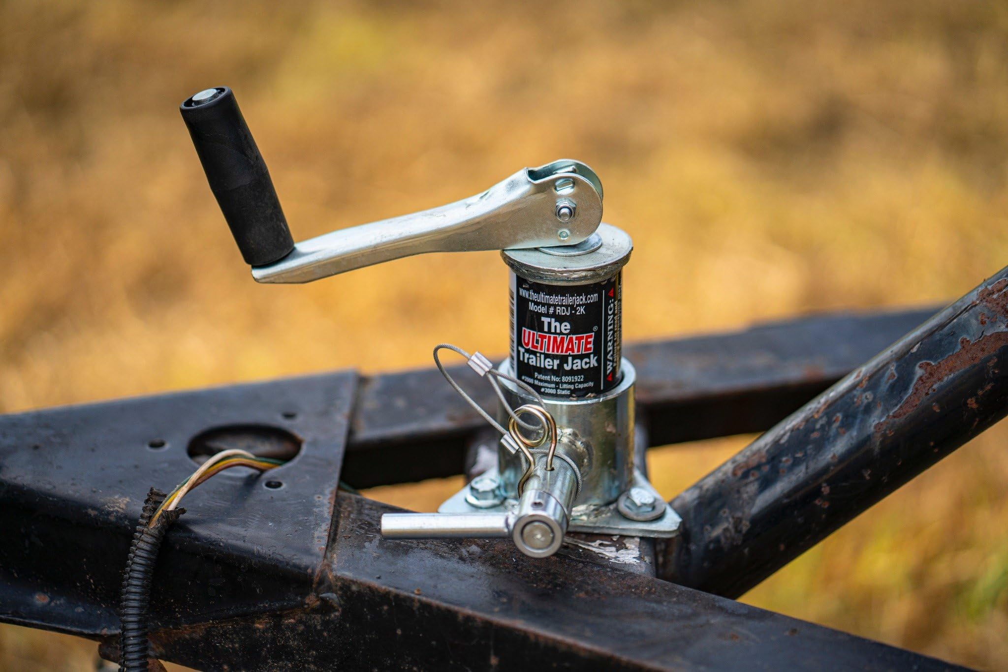 The Ultimate Trailer Jack fully raised height enables quick trailer leveling on uneven ground.