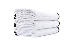 The Rag Company Dry Me A River waffle-weave towel with 70/30 microfiber for fast drying.