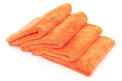Eagle Edgeless orange microfiber towel close-up shows plush fibers.